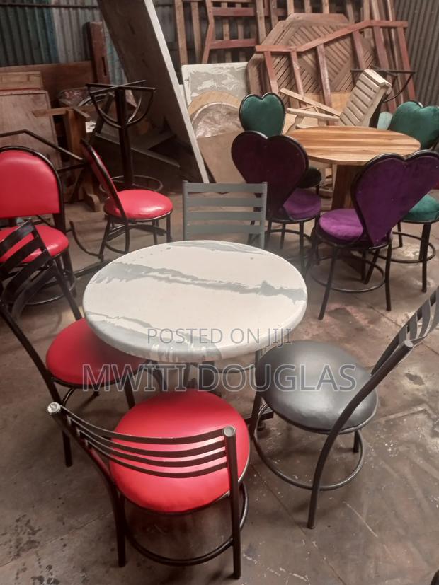 Colourful 3 Seats and a Marble Top Quality Table