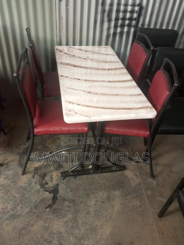 Fashionable Stlyish Hotel Four Seater With a Marble Table