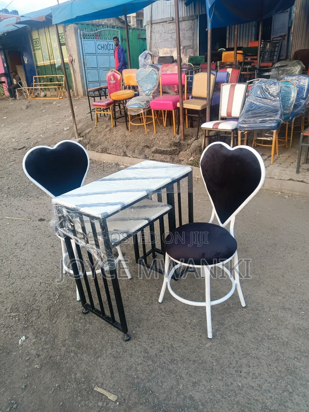 Manicure Set, Marble Table, Black and White Love Seats 