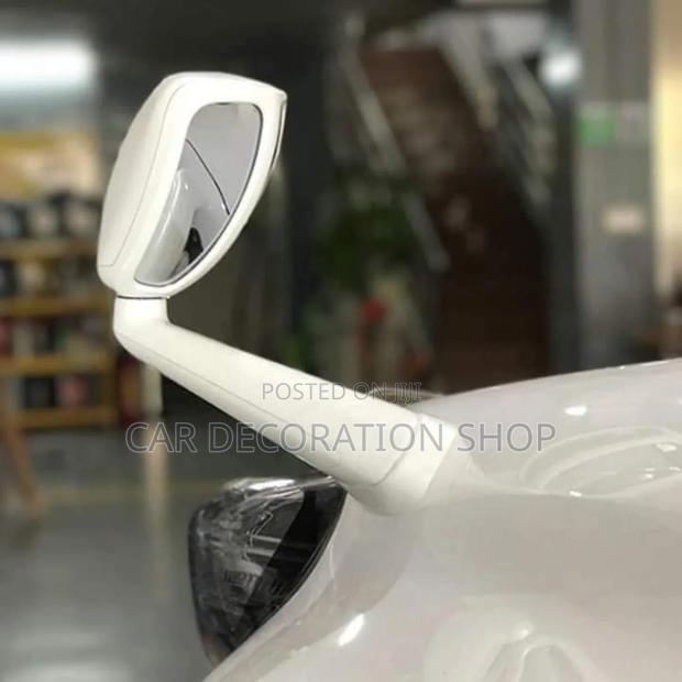 White Wing Mirror Installed on Suv Car - main view