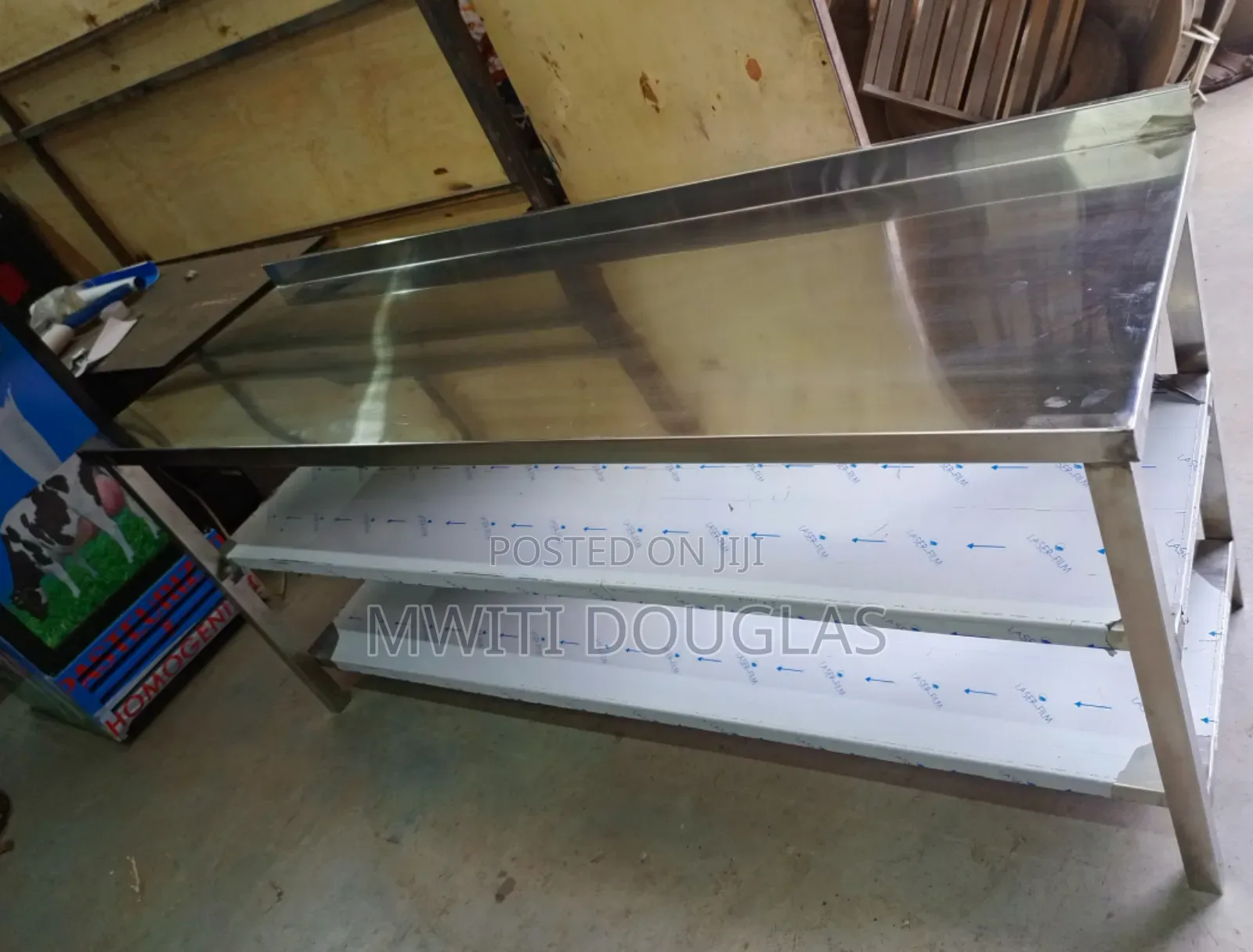 Attractive Stainless Table With Two Undesheves