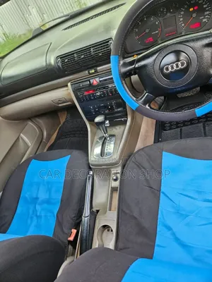 Blue Seat Cover Fitted on Saloon Car With Match Steering
