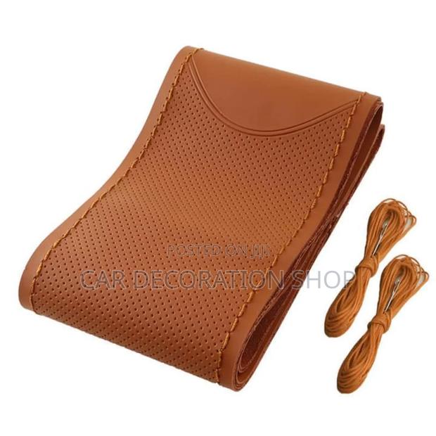 Perforated Brown Stitching Steering Cover With Needle/Thread - main view