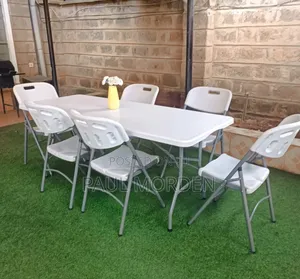 White Foldable Table With Six Foldable Chairs