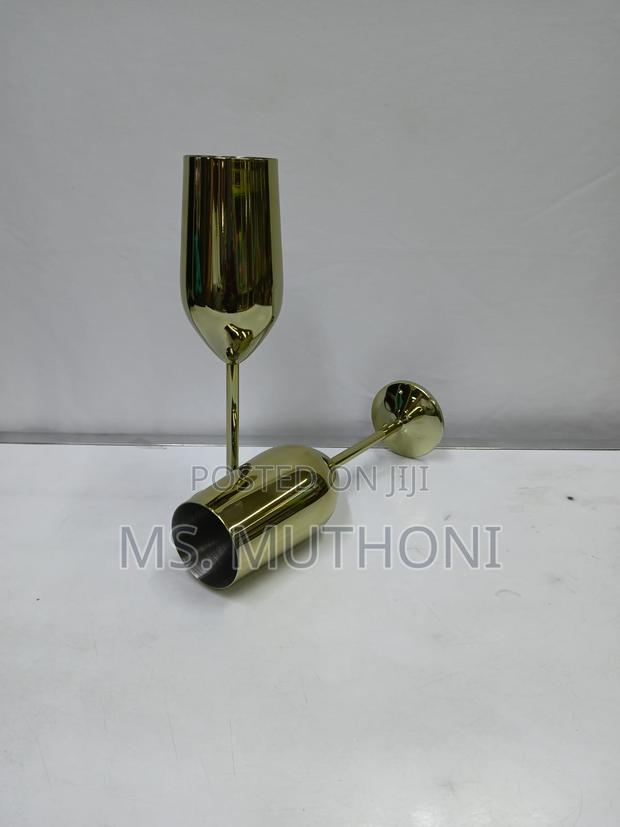 A Pair Of Gold Stainless Steel Wine Glass