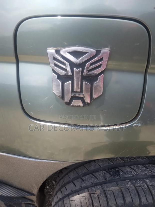Ca Decorated With Transformer Silver Badge