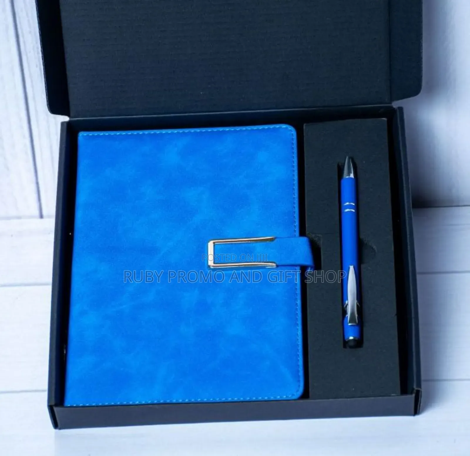 Blue Executive Notebook and a Pen