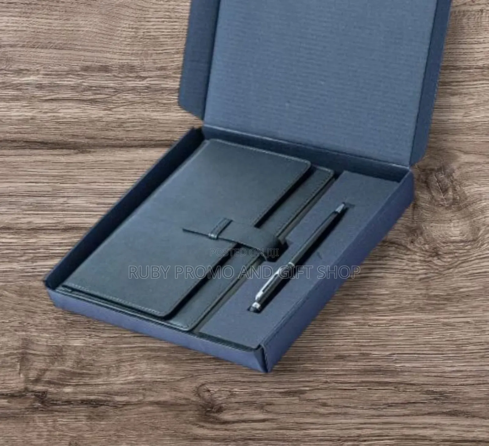 Black Executive Notebook and a Pen