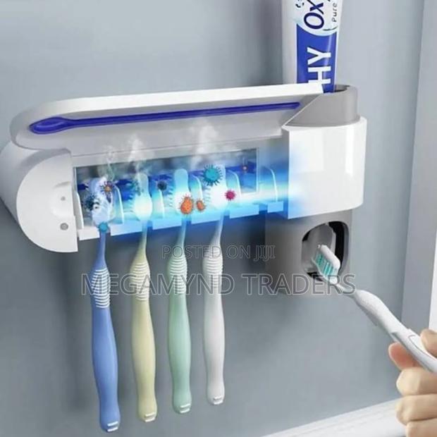 3 in 1 Toothbrush Sterilizer,Holder and Past Dispenser.
