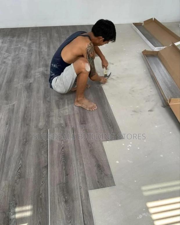 Grey SPC Flooring Interlocking Planks.