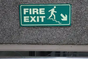 Fire Exit On Stairs Right Down Sign