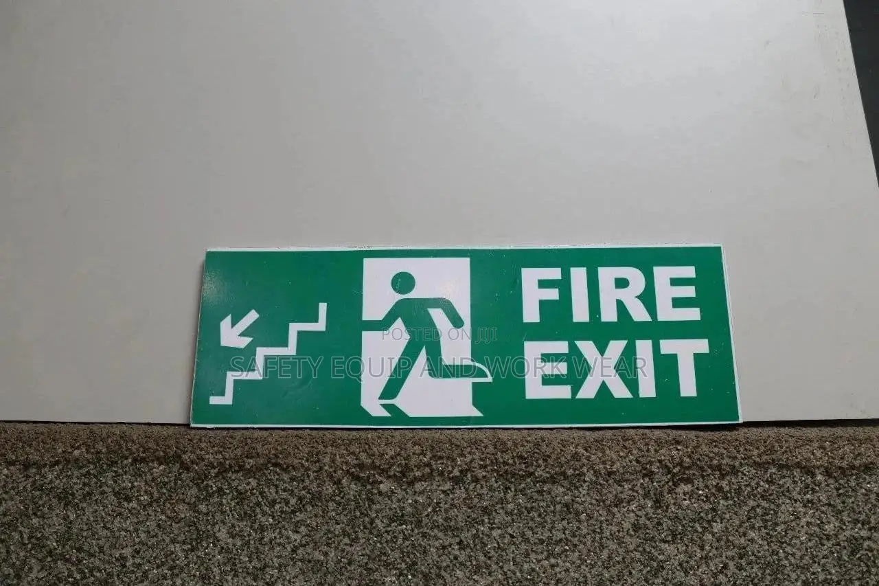 Fire Exit Stairs Sign On The Left