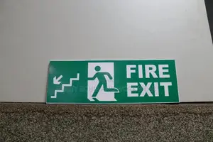 Fire Exit Stairs Sign On The Left