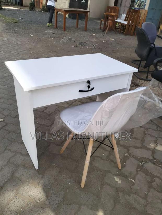 White Eames Chair and Studying Desk