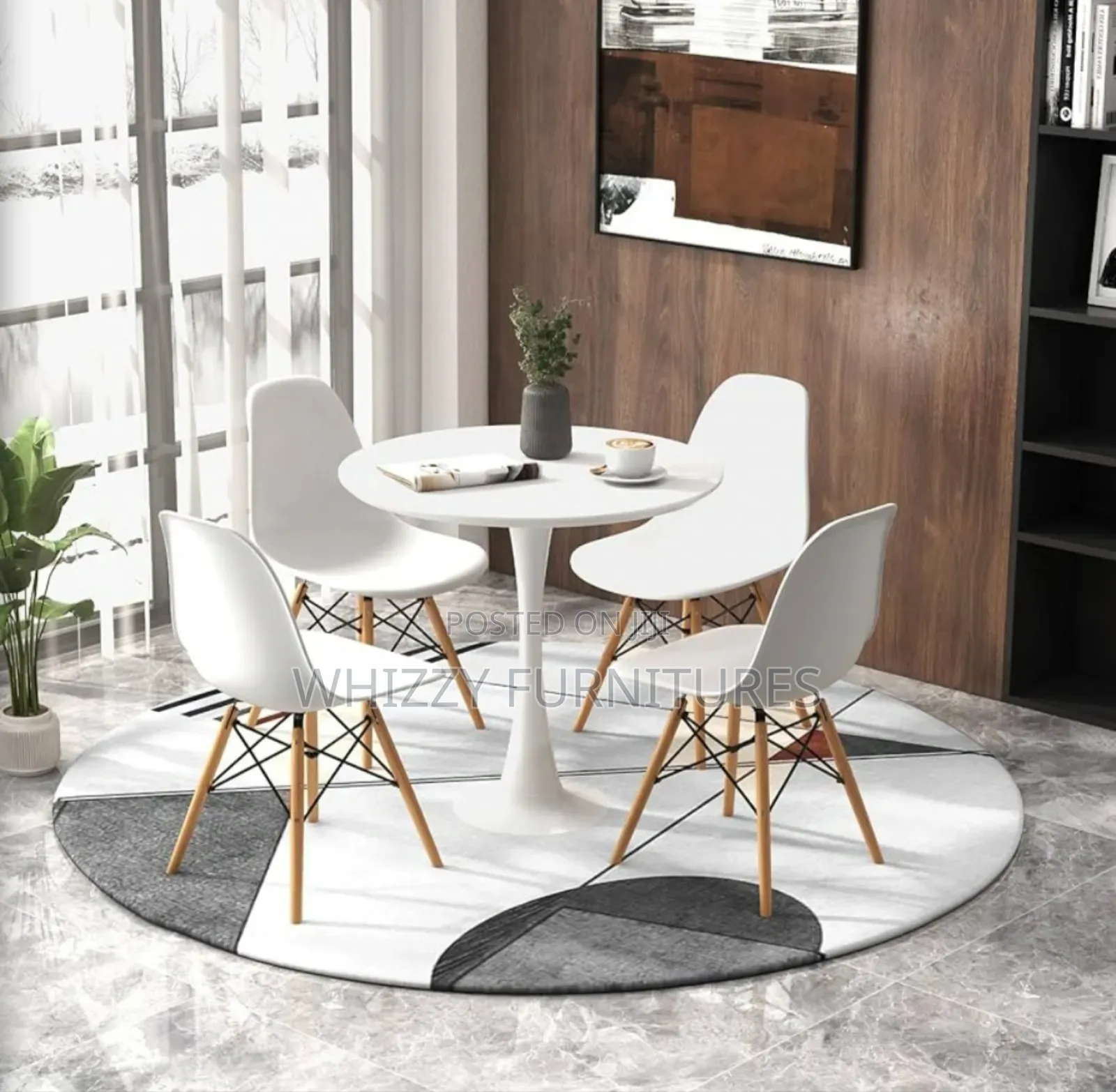 4 Seater Round Marble Table and Eames Chairs
