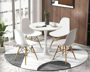 White Round Dining Table With Four Dining Chairs