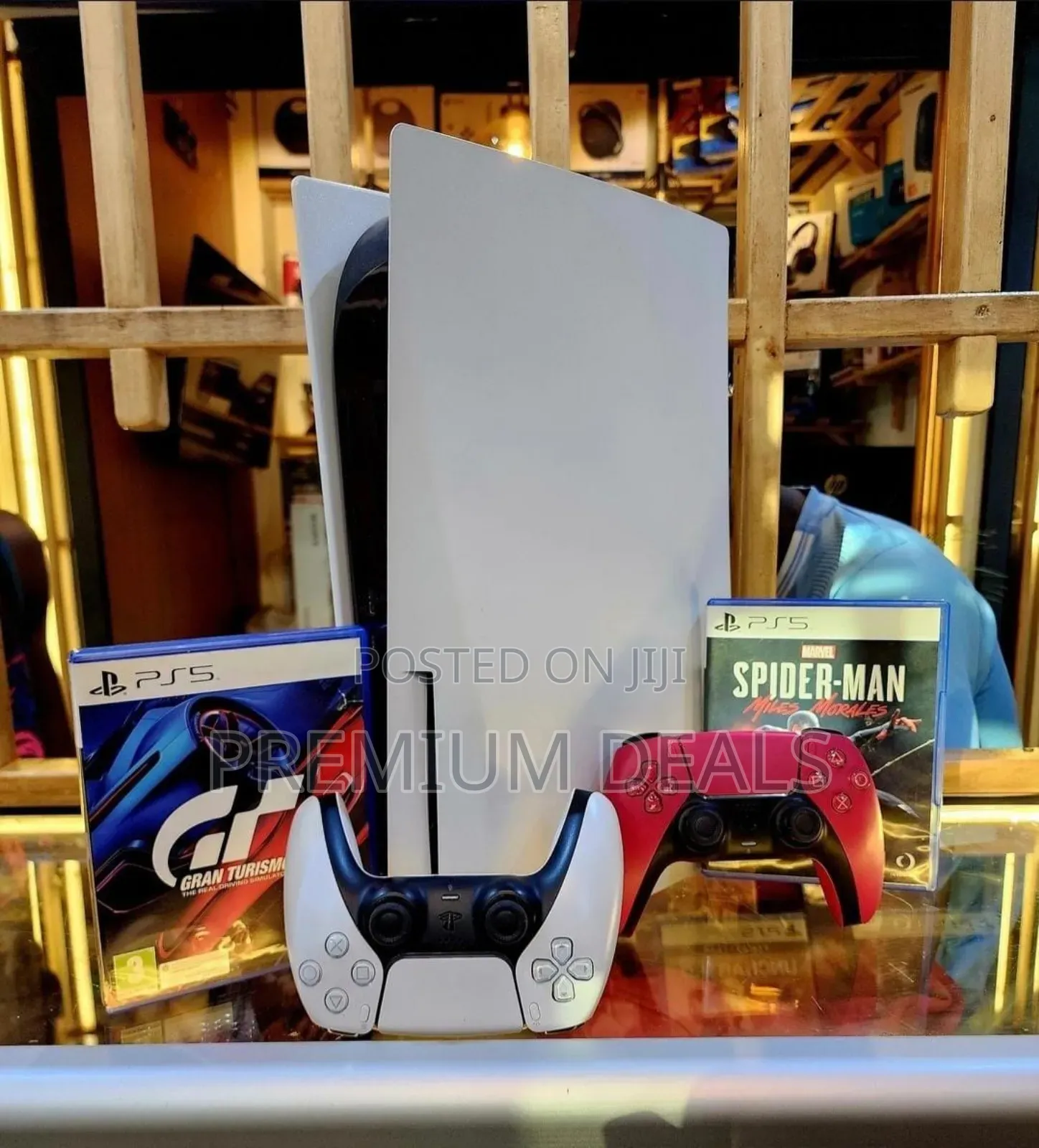 Complete Ps5 With Games and Two Controllers.