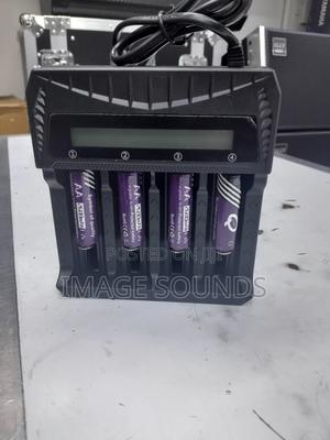 Charger With Display Plus 4 Rechargeable Batteries - main view