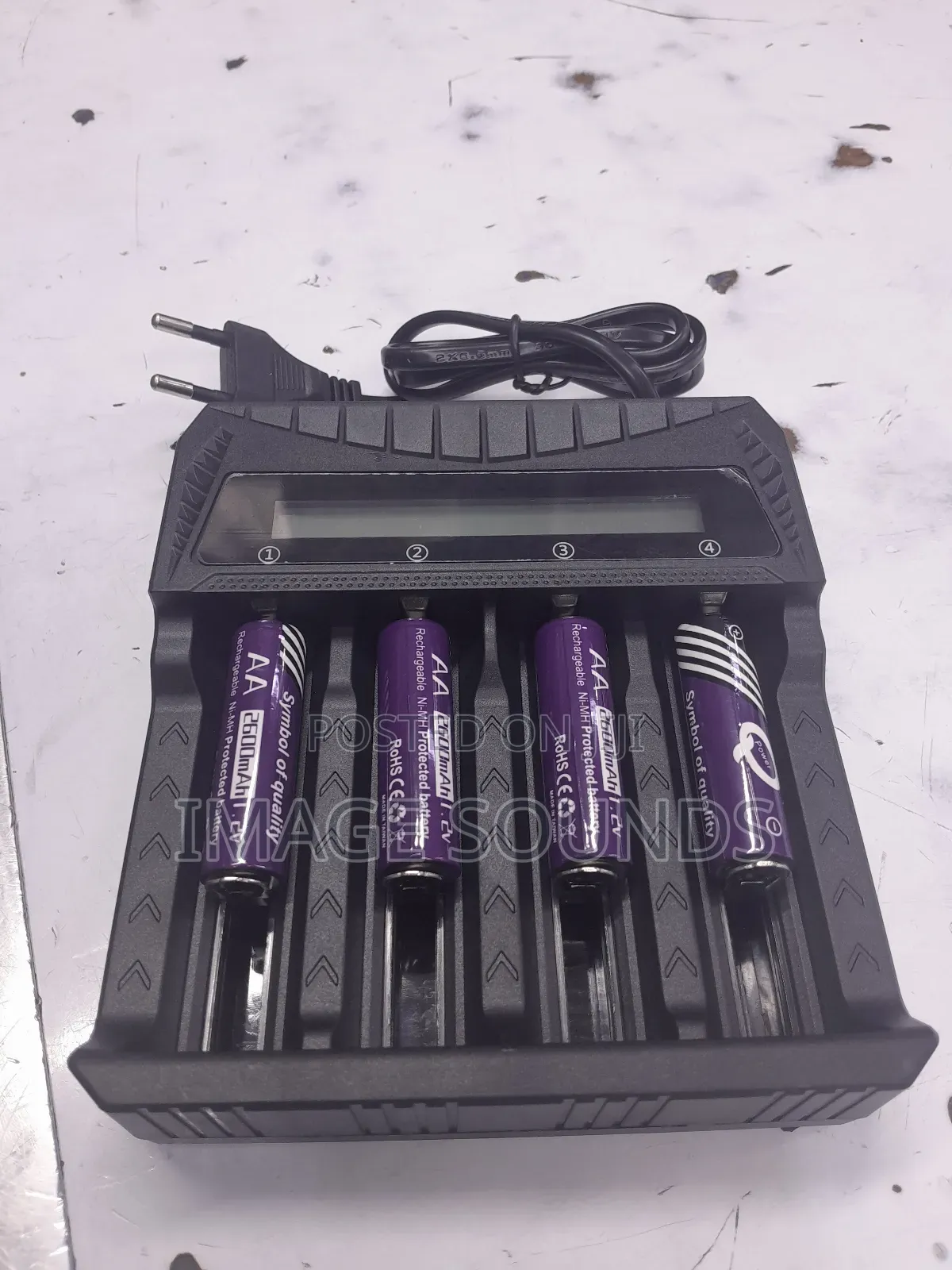 Charger With Display Plus 4 Rechargeable Batteries