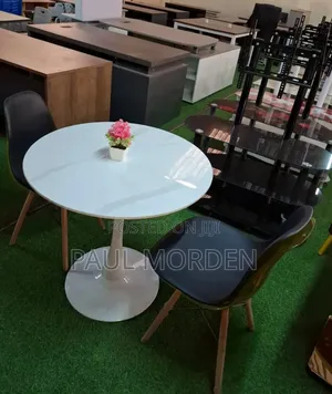 Luxurious Dining Table With Two Dining Chairs