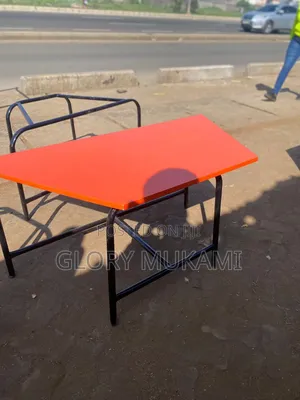 Orange Painted Kindergarten Tables