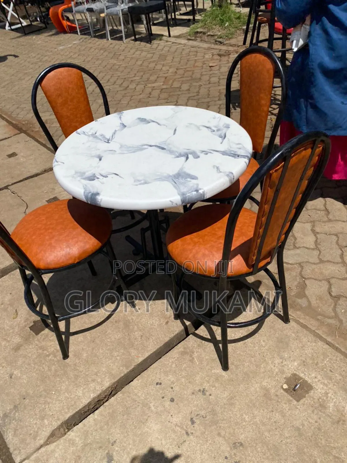 White Round Marble Table and Chairs