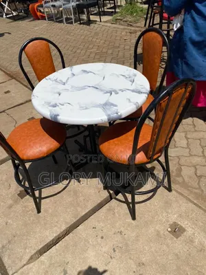 White Round Marble Table and Chairs