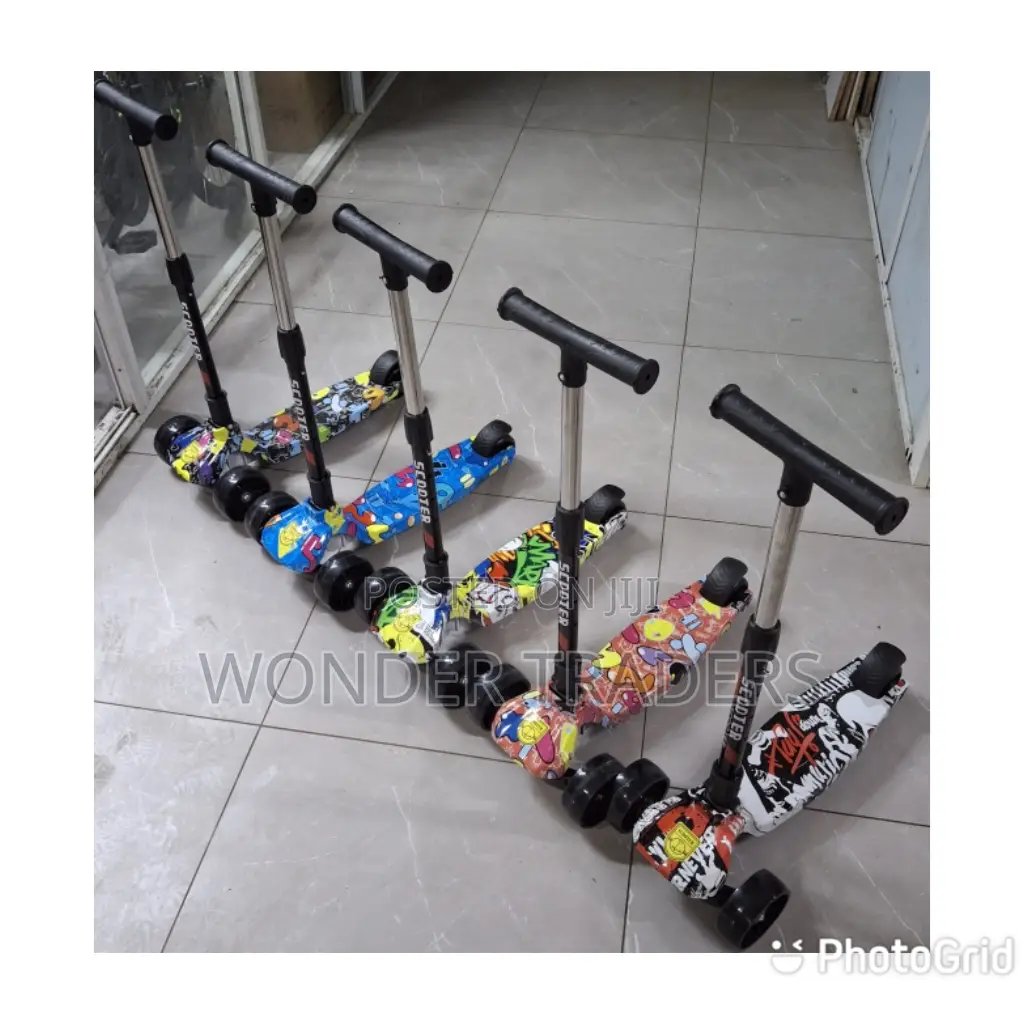 Small Wide Wheels Scooter Has Melodies and Lights