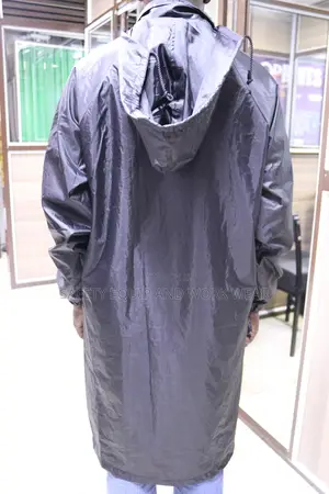 Rain Jacket Buttoned And Zipped