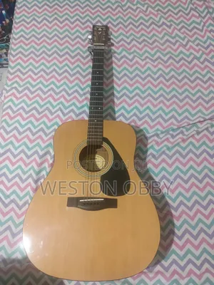 Yamaha Guitar With Bag and Capo