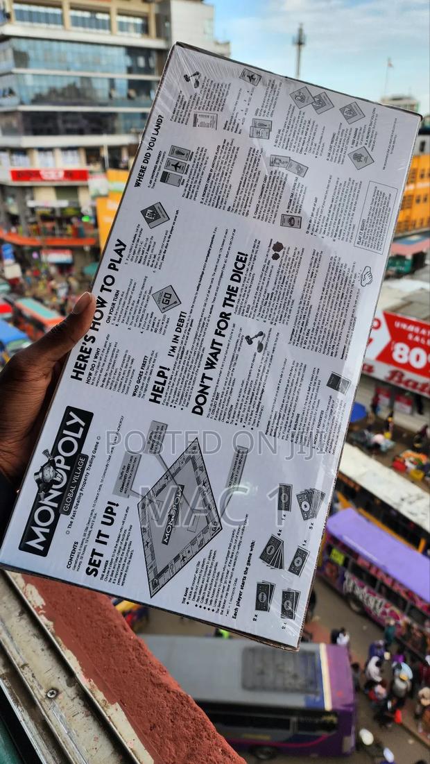 Monopoly Global Village Board Game Red - thumbnail 2