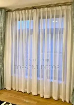 Greenish Window Curtains and White Sheers