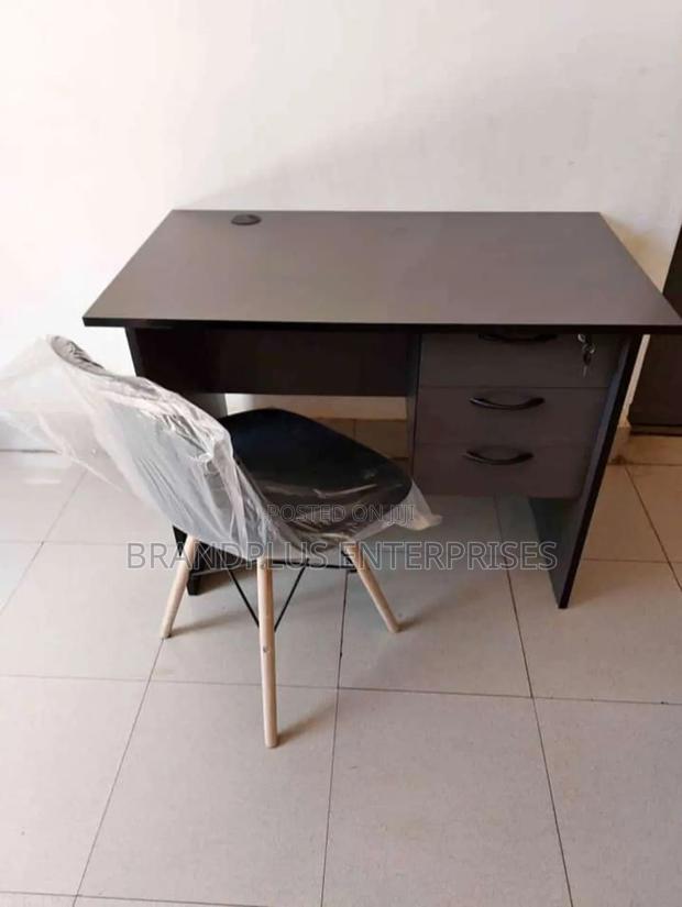 Gray Desk and Eames Chair