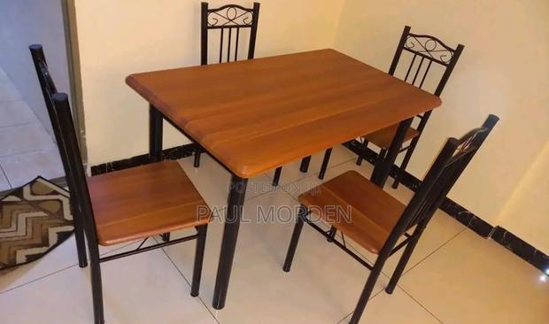 Wooden Dining Table With Four Dining Chairs