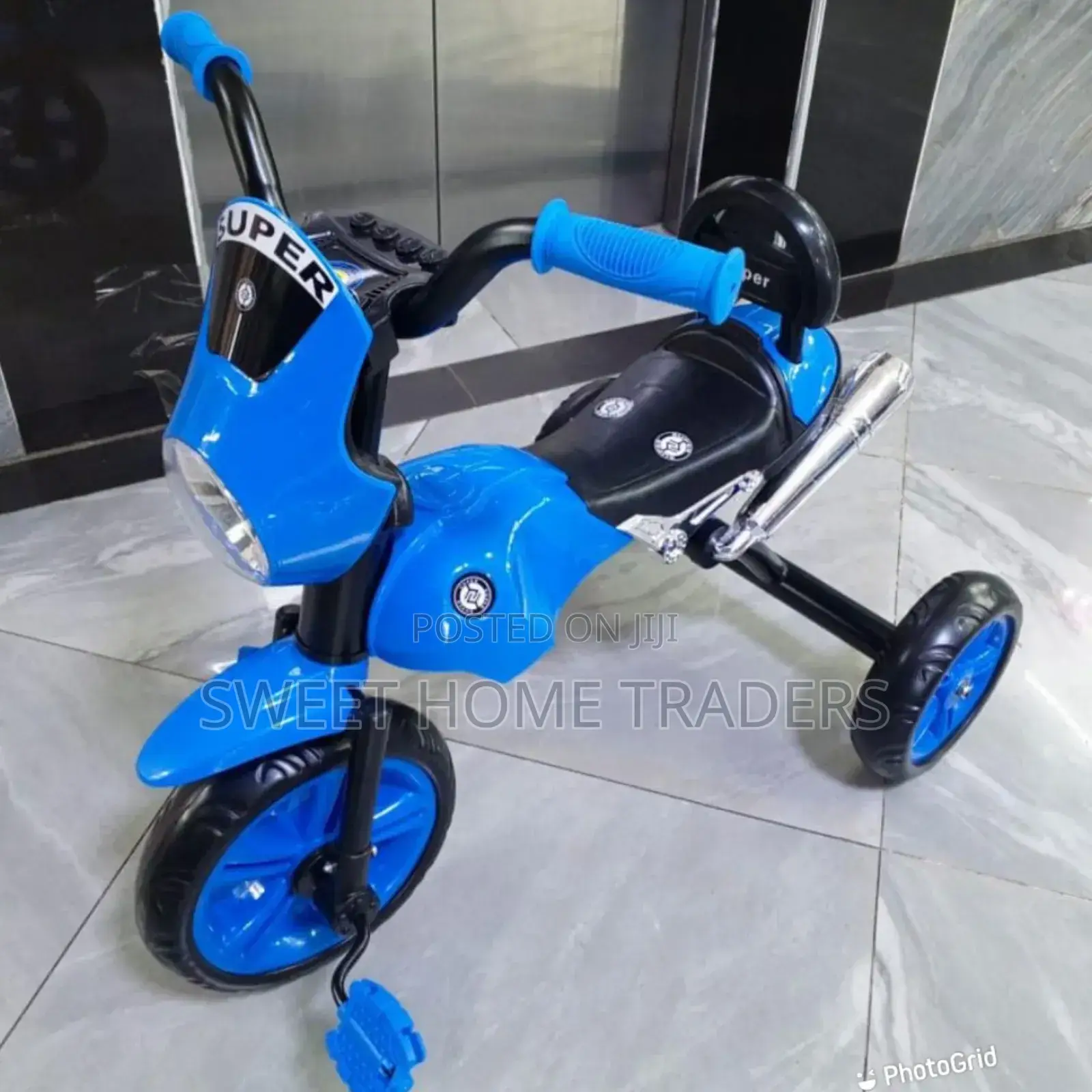 Tricycle With Torch Blue