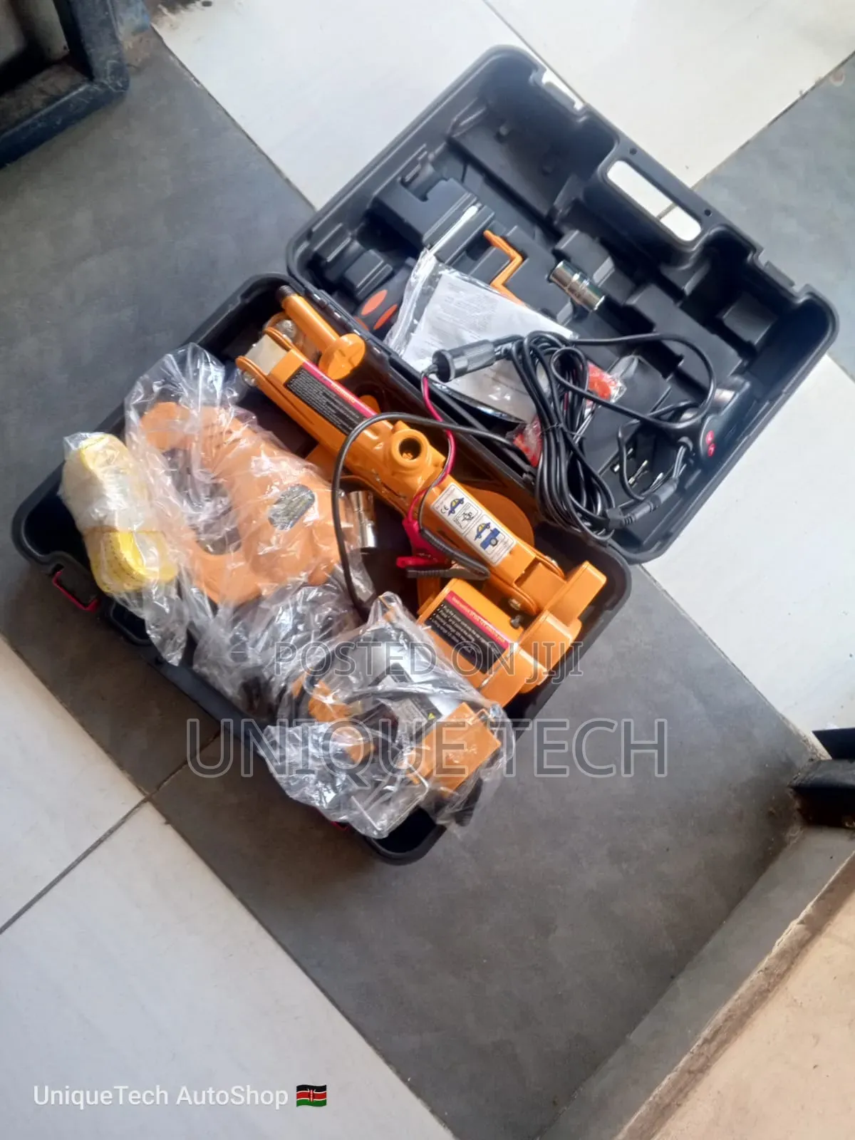 3-in-1 Car Jack Kit: Lift, Tighten, and Inflate With Ease