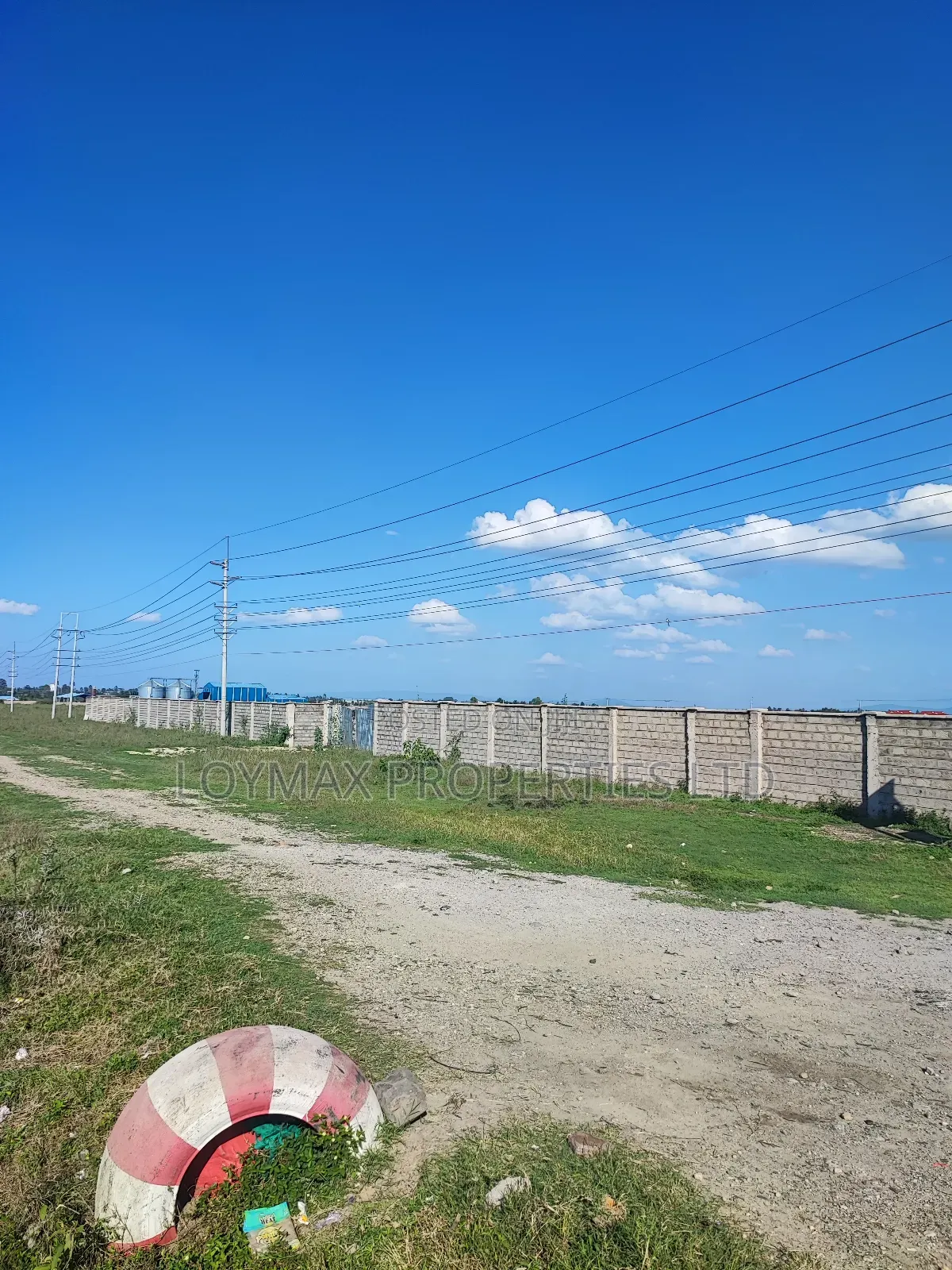 6 Acres on Tarmac Also Touching Kisaju Prayer Centre Road.
