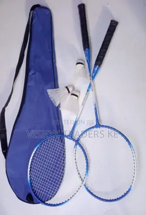 A Pair of Badminton Rackets With 3 Shuttlecocks