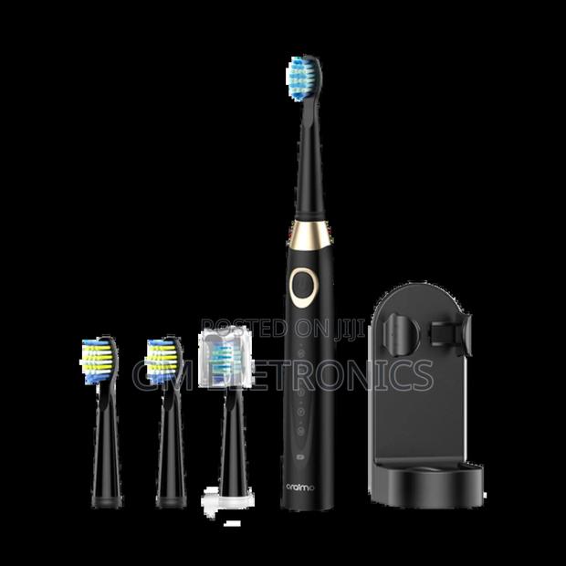 Oraimo Smartdent C2 Smart Electric Toothbrush With Holder.