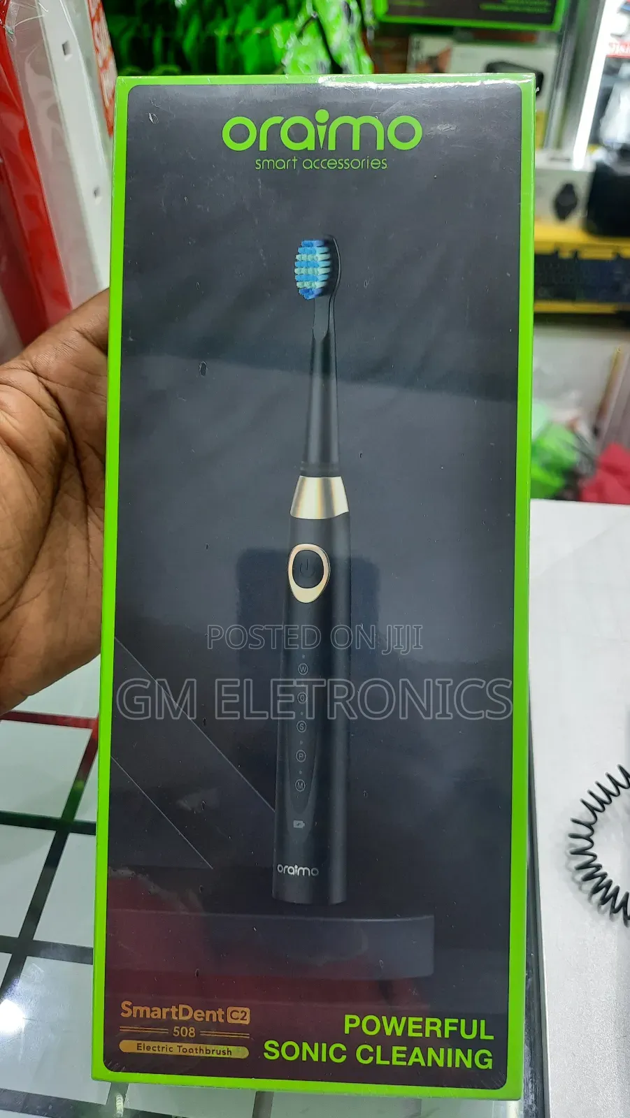 Oraimo Smartdent C2 Smart Electric Toothbrush With Holder.