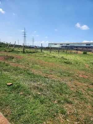 100 by 100 Industrial Place