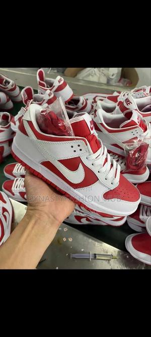 champion red dunks on feet