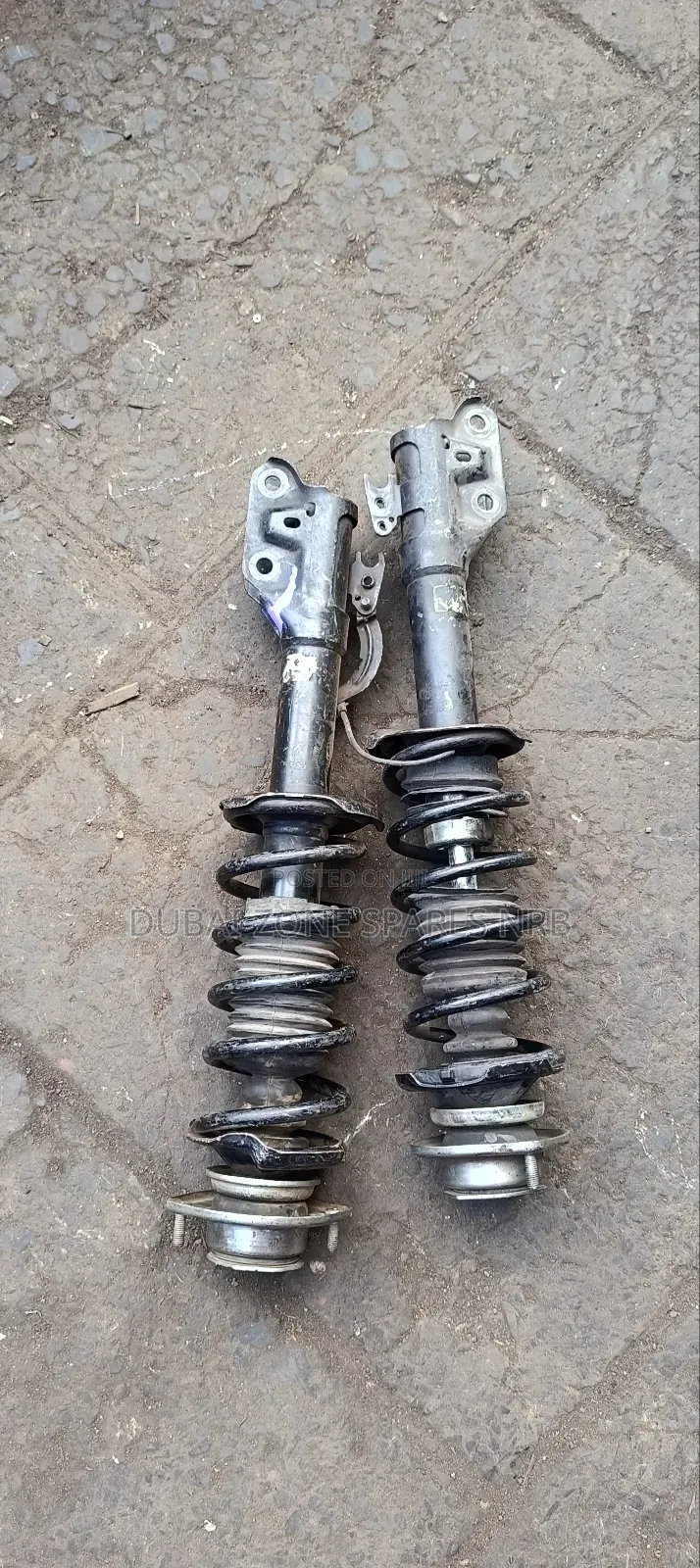 Shocks Complete Nissan Note, March, Wingroad, Tiida,Suzuki.