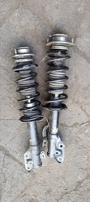 Shocks Complete Nissan Note, March, Wingroad, Tiida,Suzuki.