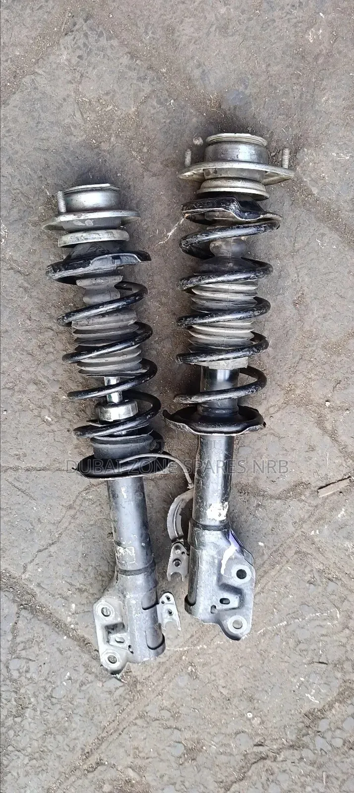 Shocks Complete Nissan Note, March, Wingroad, Tiida,Suzuki.