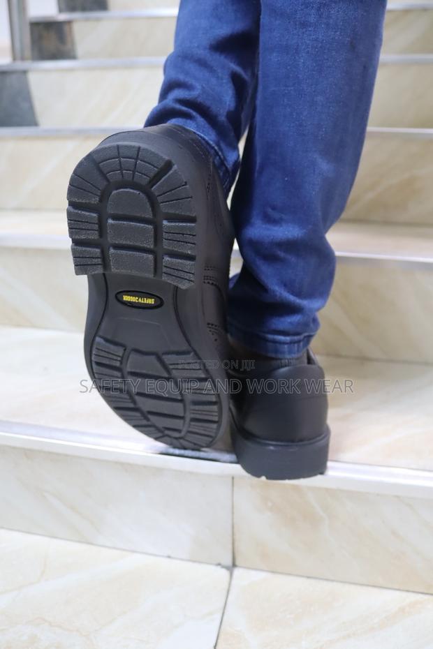 Manager Safety Shoes At Workplace