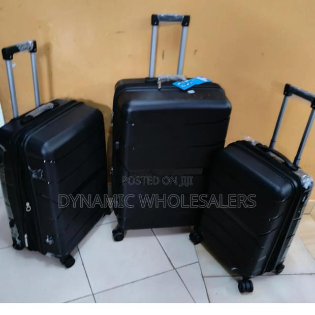 Black Unbreakable Rubber Suitcase - thumbnail 2