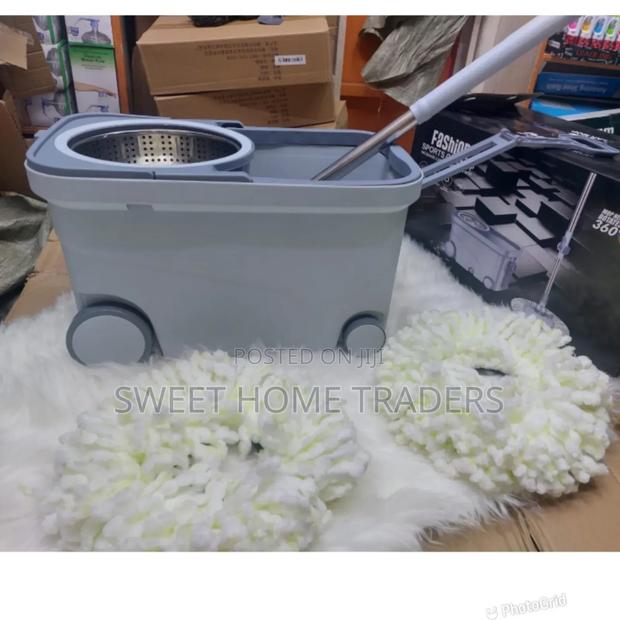 Household Magic Spin Mop With 4 Wheels.