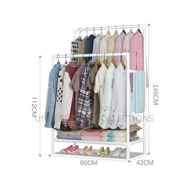*Double Pole Clothing Rack With Lower Storage Shelf.