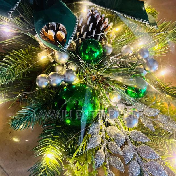 Green Christmas Wreath With Pendant Lights